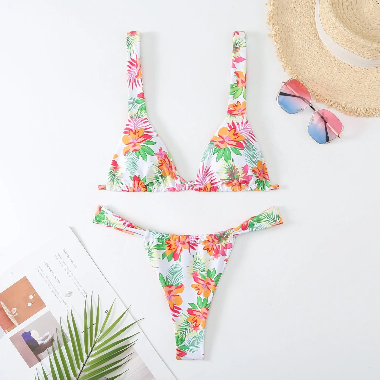 Women's floral print bikini swimsuit in rose red, blue, sky blue or white colours with S, M, L sizing