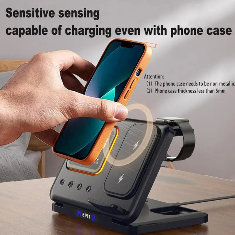 Black and white 15W wireless charging station with LED display showing time, charging phone, watch and headphones