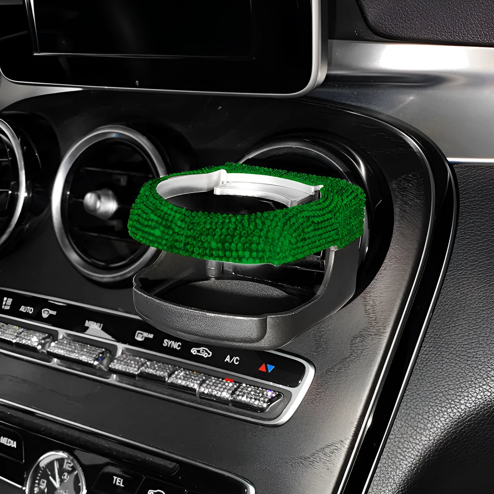 White diamond-encrusted ABS plastic car cup holder bracket mounted on a car air vent.