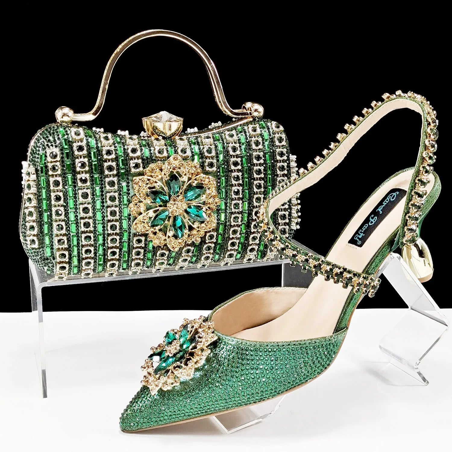 Women's black high heel shoes with matching clutch bag, decorative drill buckle flower ankle chain, and rhinestone details.