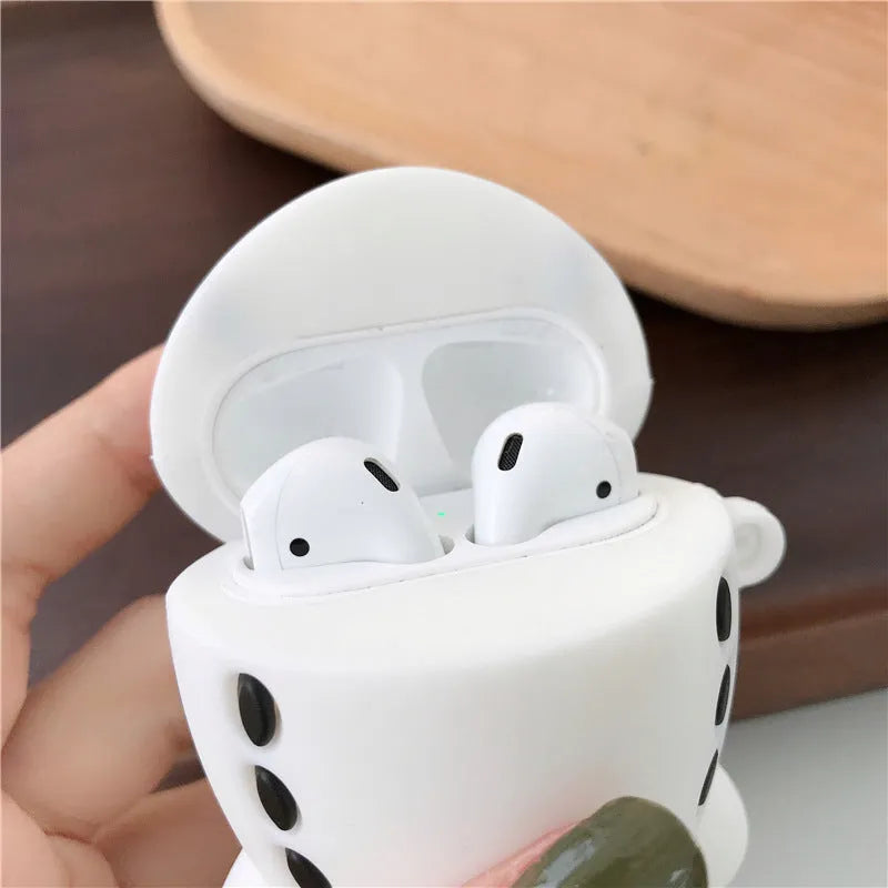 Blue silicone flip case for AirPods 1 and 2 with cartoon aeroplane headset design and attached lanyard hook.