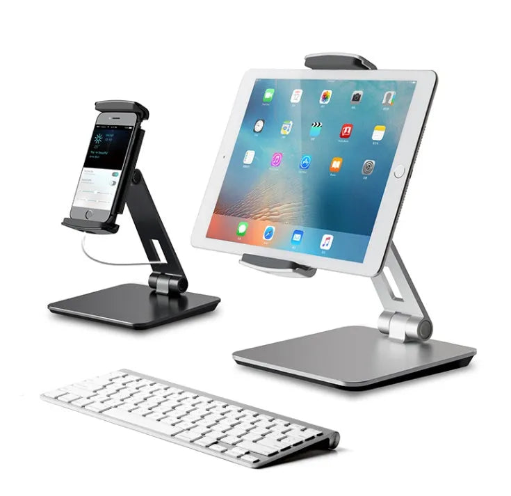 Foldable aluminium and ABS desktop stand holding a tablet at an angle.