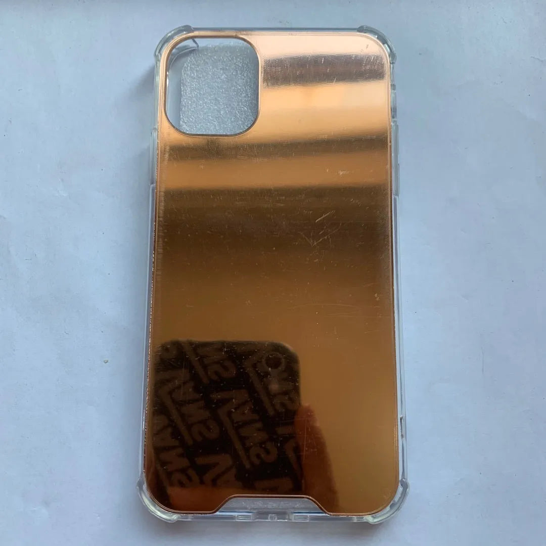 Mirrored back protective TPU case for iPhone on a table