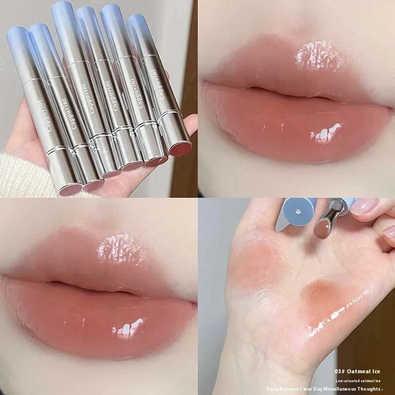 Mirror water light lip gloss lipstick showing six translucent shades in compact case.