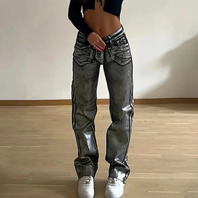 Women's washed blue high waist straight leg denim jeans with street hipster styling and contrast colour details