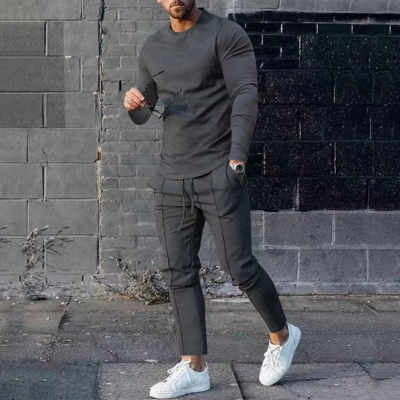 Men's two-piece casual suit with round-neck long sleeve T-shirt and matching trousers in solid colour