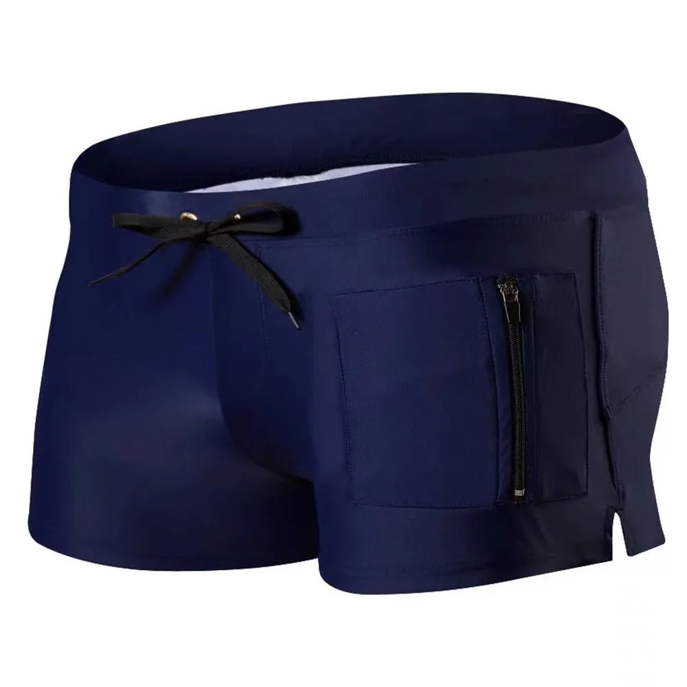Men's solid colour high-waist swimming trunks with lace-up front, shown in black, for swimming and fitness
