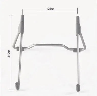 Grey aluminium alloy and plastic stand holding a mobile phone and a laptop on a desk.