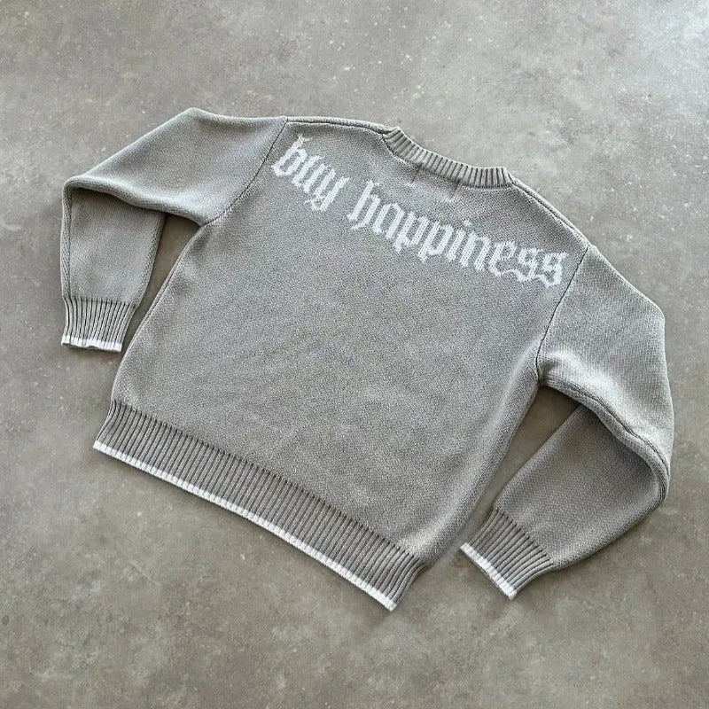 Grey loose-fitting knitwear coat with long sleeves and textured Jacquard weave pattern
