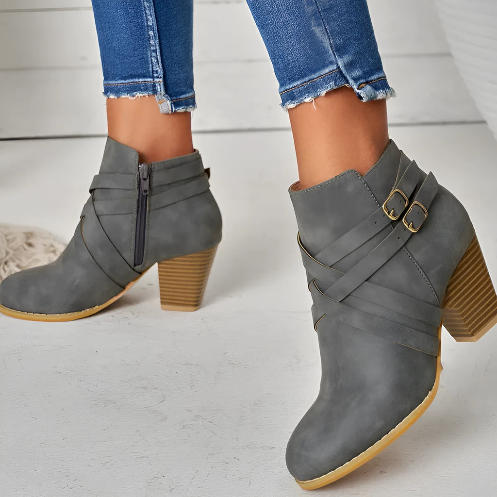 Women's plus size grey ankle boot with a 7cm heel and side zipper.