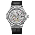 Men's automatic mechanical watch with skeleton dial and diamond bezel on wrist