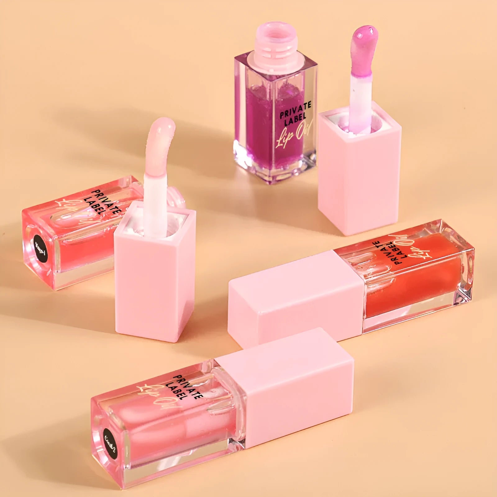 Women's transparent lip gloss set showing six shimmer colour variants in 6ML bottles