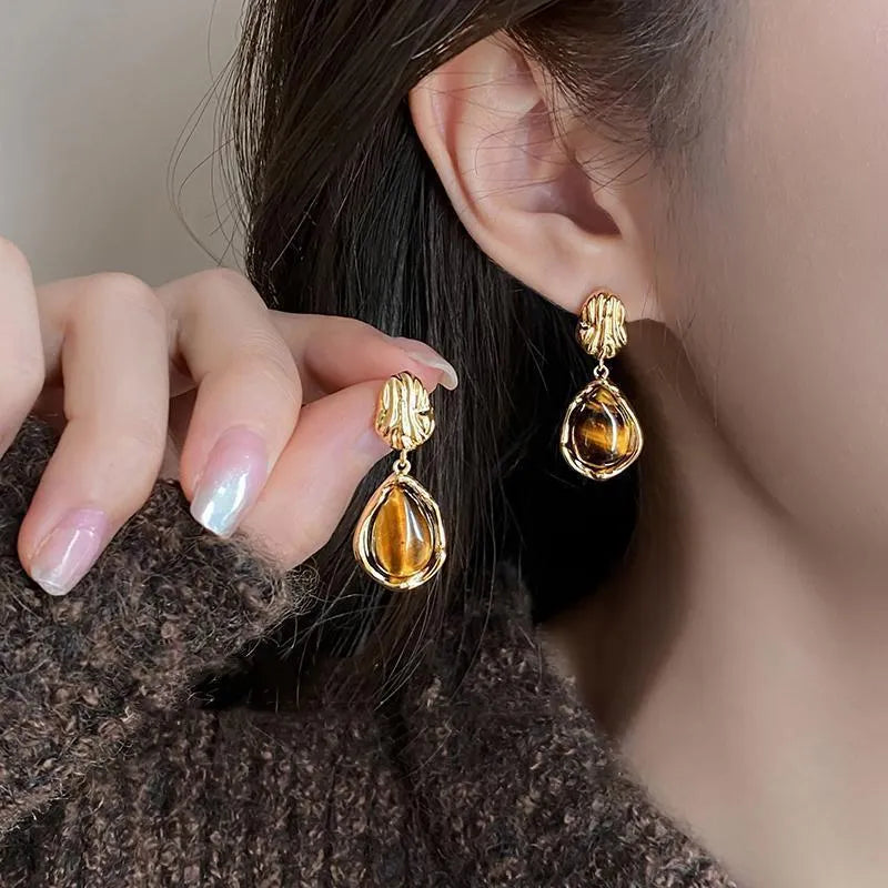Three pairs of handmade geometric holiday earrings with electroplated alloy and tassel decorations