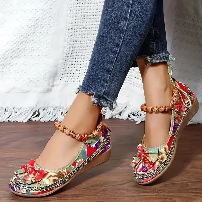 Women's plus size black ethnic platform sandals with elastic band and round toe on a PU sole.