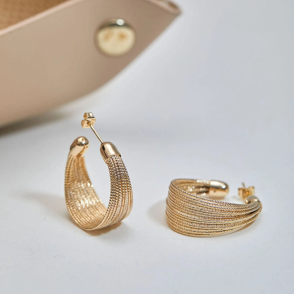 Copper geometric multi-layer bracelet earrings in silver or gold finish, available as clip-on or stud styles