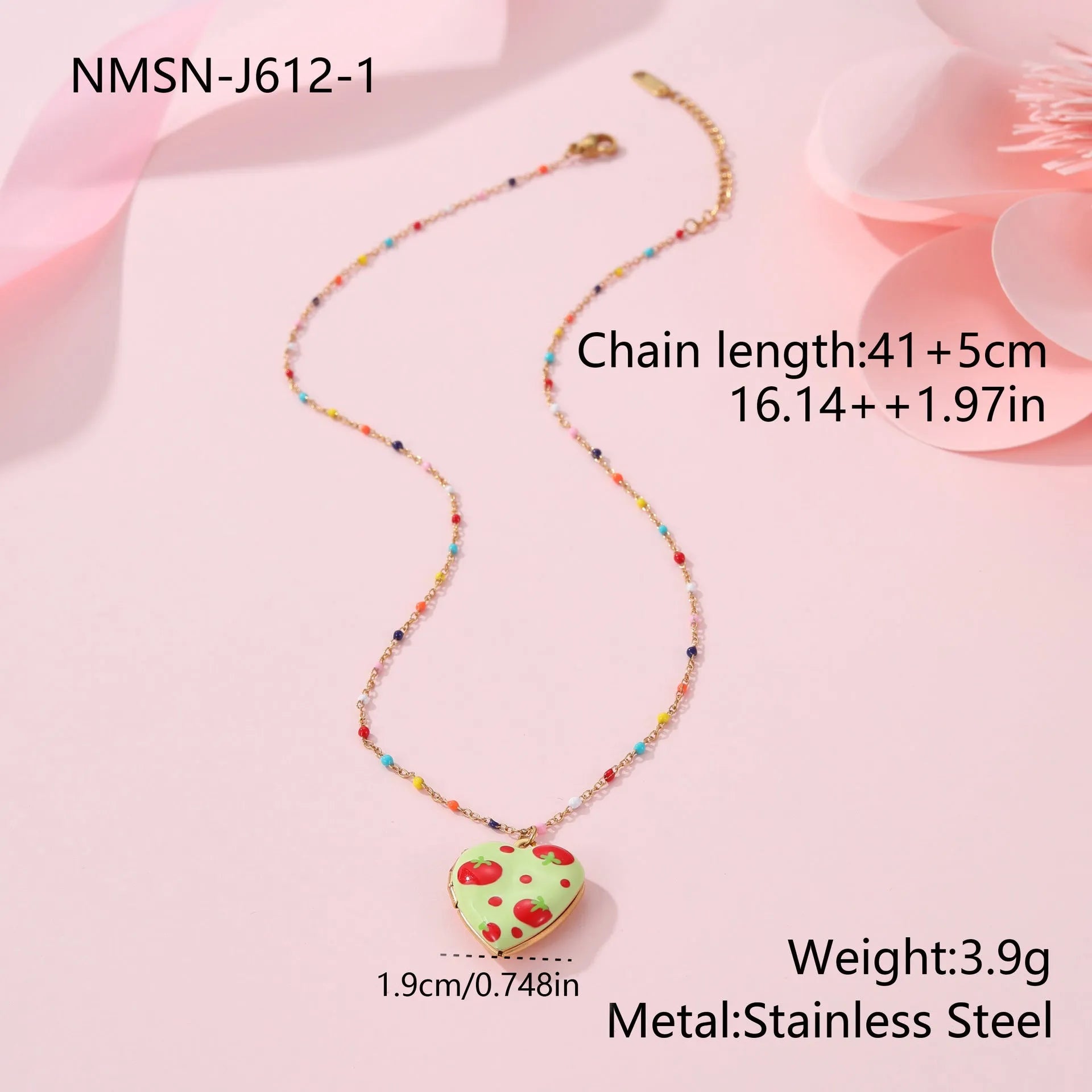 Gold-plated heart-shaped fruit pendant necklace on a stainless steel chain, showing grape design detail.