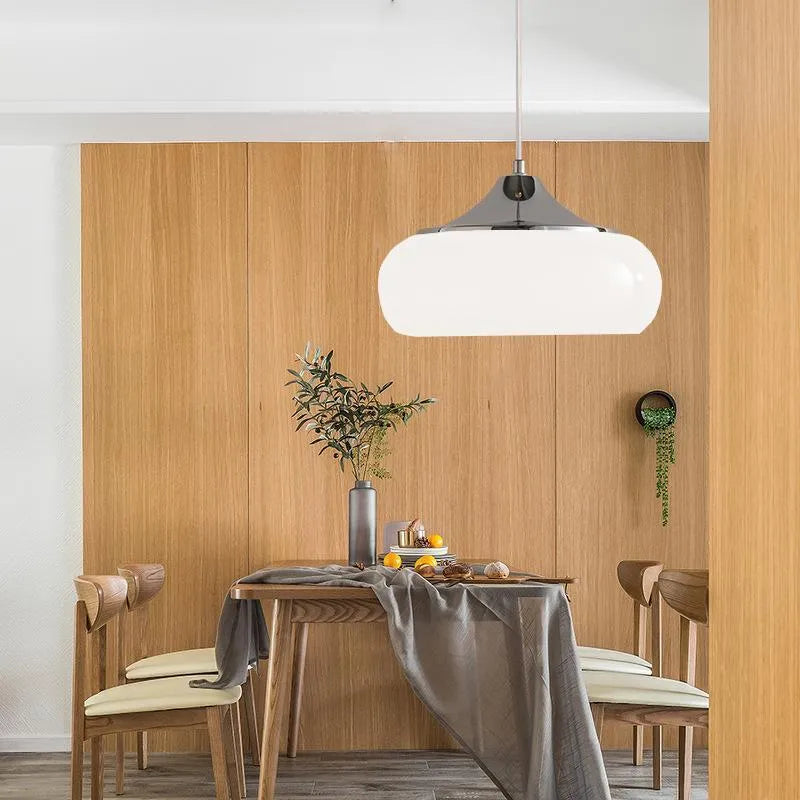 Bauhaus three-headed glass egg tart pendant light in retro style, shown in milk white.