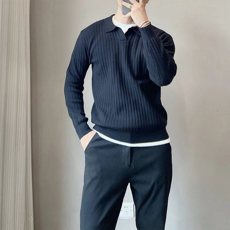 Man wearing a loose-fit Army Green knitted pullover sweater with long sleeves.
