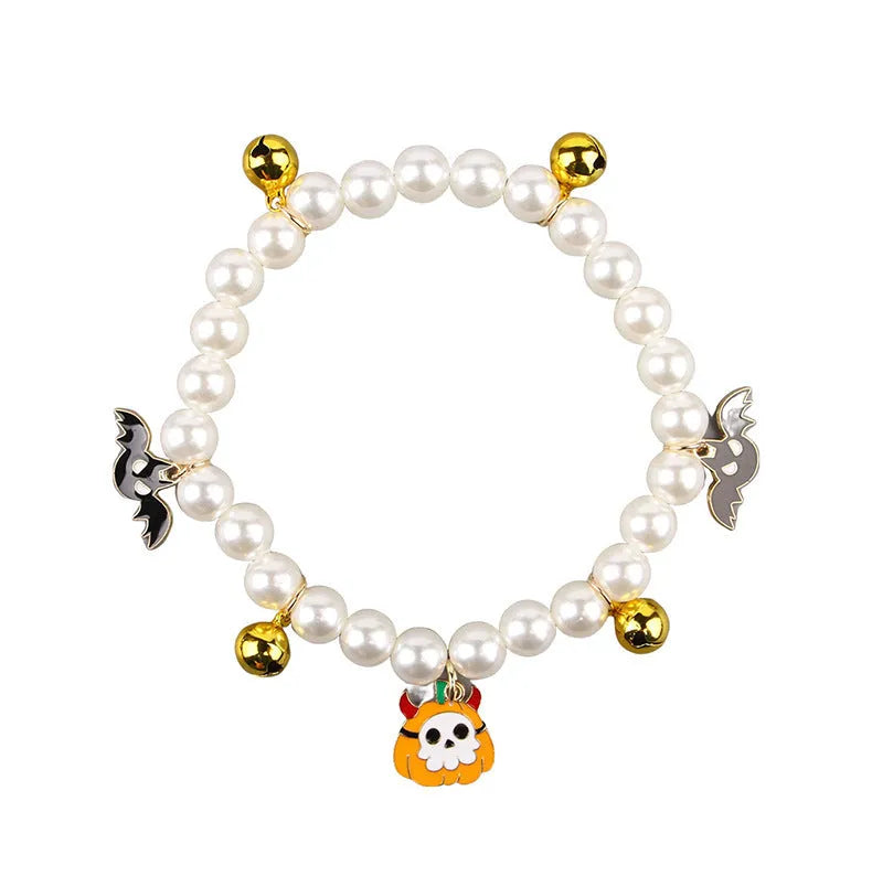 Halloween cat collar with simulated pearl necklace decoration showing pumpkin print patterns