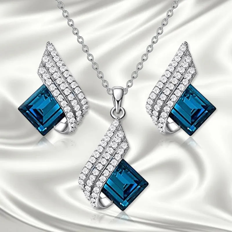 Women's necklace and earring set with cross chain design and glass pendant in alloy with electroplated finish