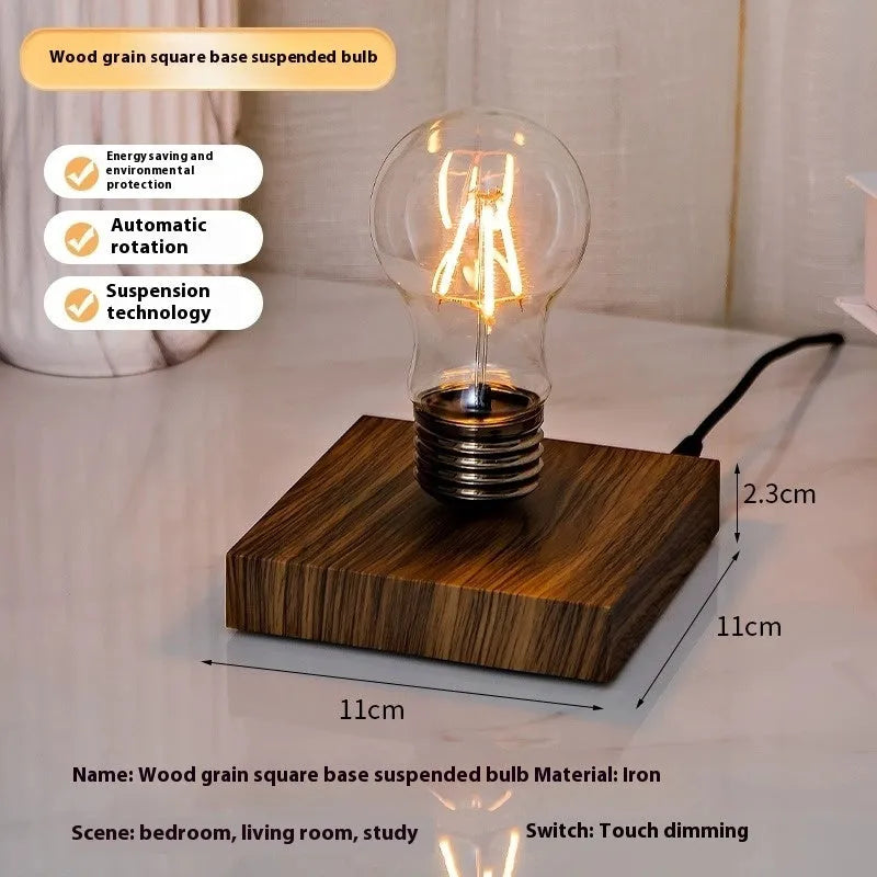 Suspended bulb night lamp on black wood grain base measuring 11cm for desktop decoration