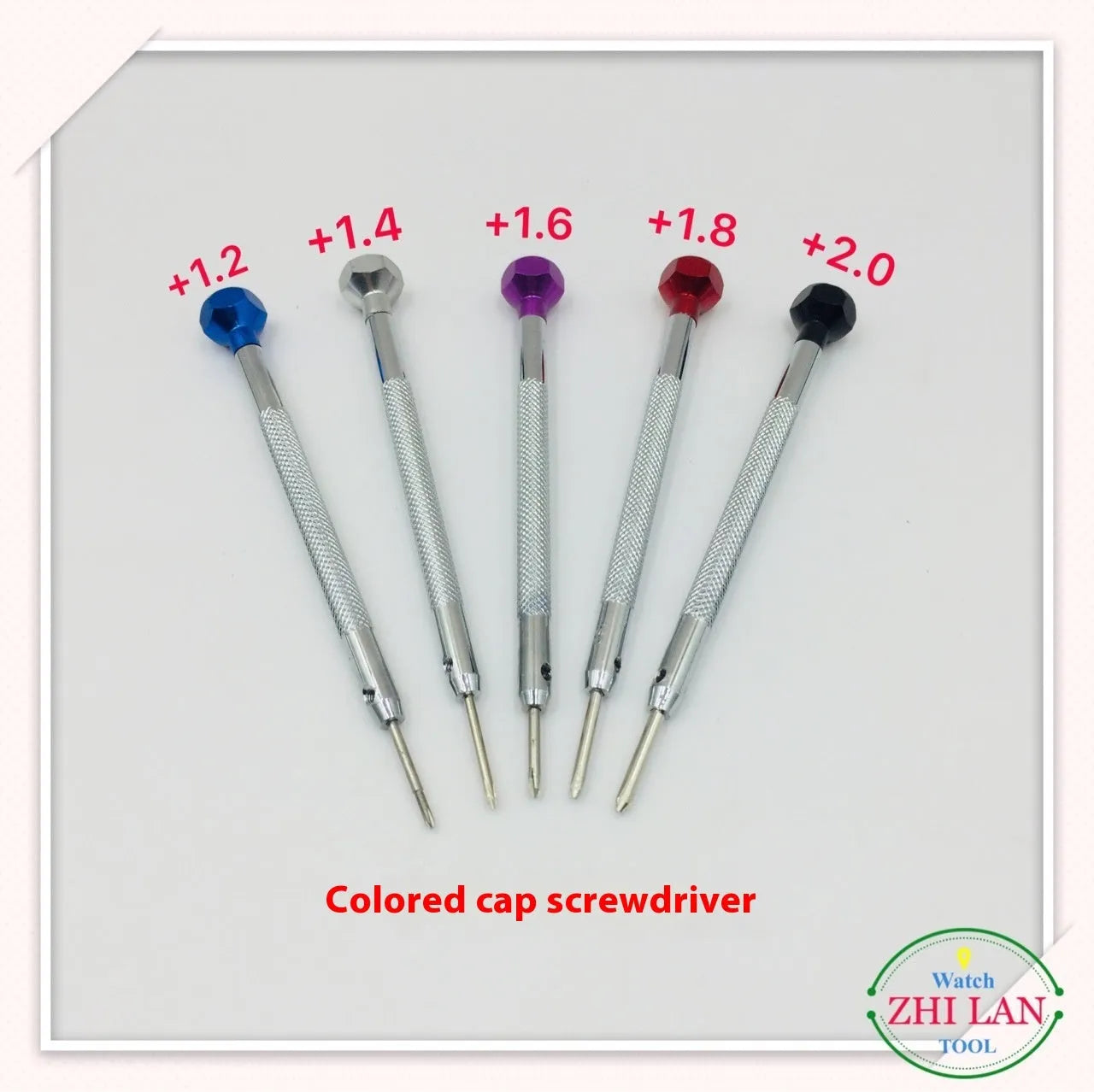 Six colour-coded aluminium handle screwdrivers with copper grips for watch and precision repair work.