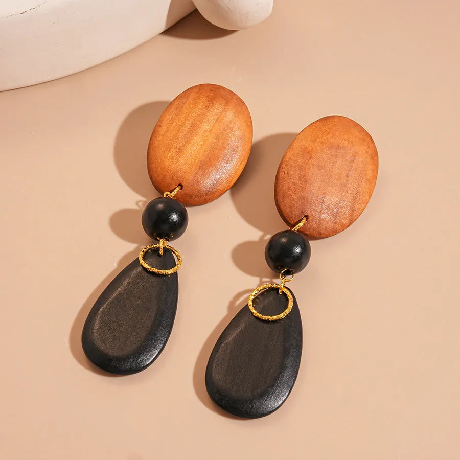 Brown black wooden ellipse earrings with silver needle fittings retro European style
