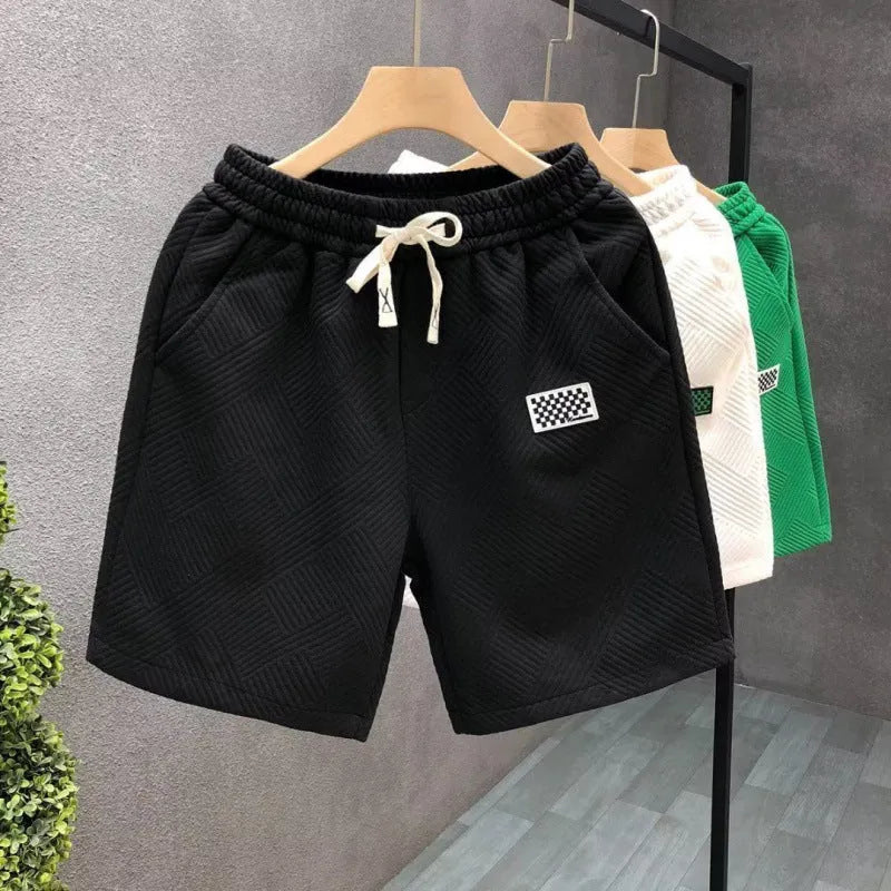 Men's casual sports shorts in black, green, or white with American style cut and micro-elastic polyester fabric