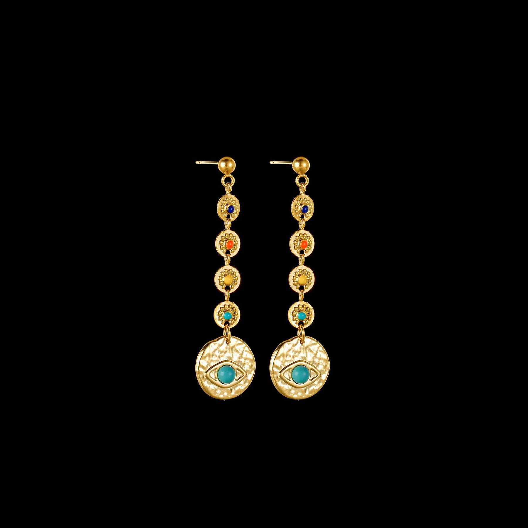 Geometric stainless steel earrings showing eight-point star, eye symbol, and shell sun designs