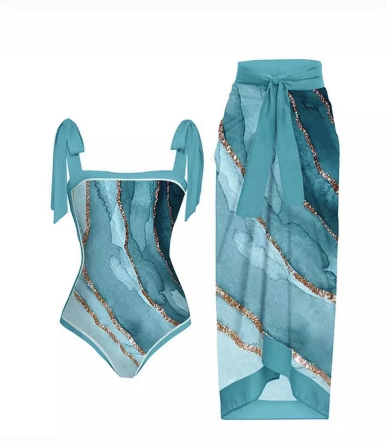 Women's yellow one-piece swimsuit with floral pattern and matching white chiffon skirt.