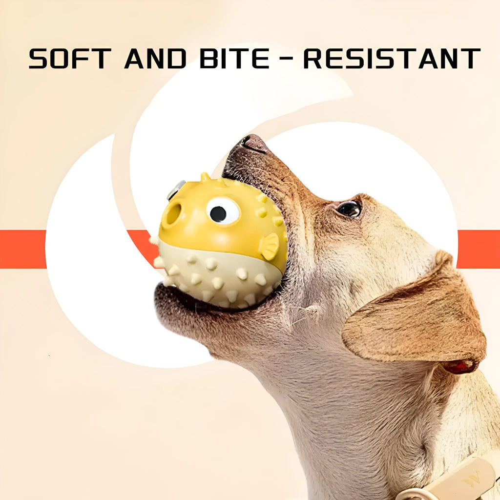 Yellow fish-shaped vinyl dog chew toy with textured surface and squeaker for aggressive chewers