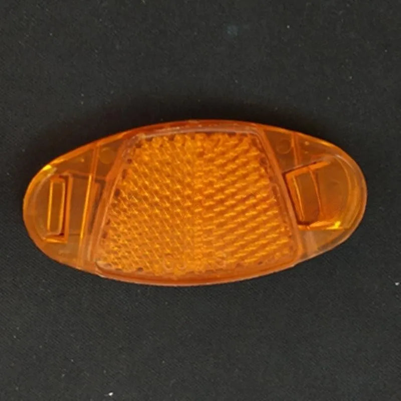 White and yellow plastic bicycle spoke reflectors with hot wheels decoration for night safety