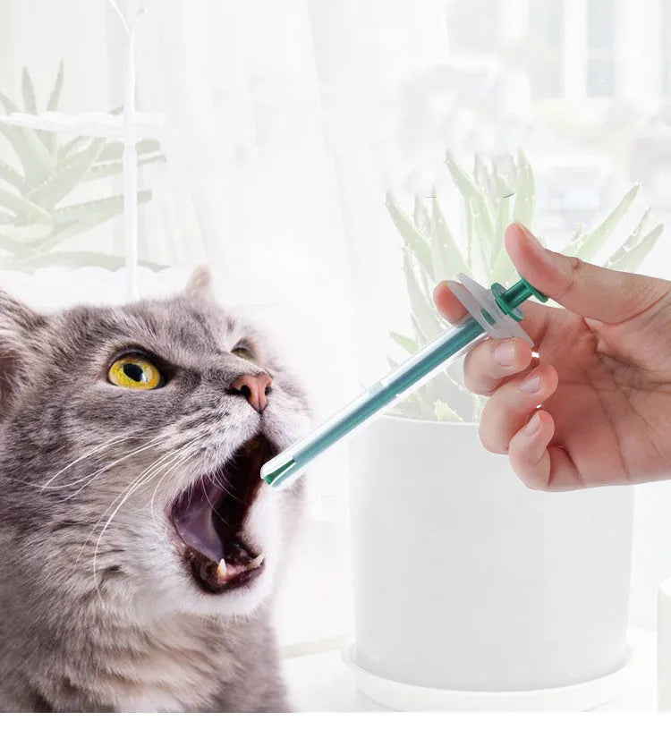 Two pet pill shooters with soft silicone tips for administering medication to cats and dogs