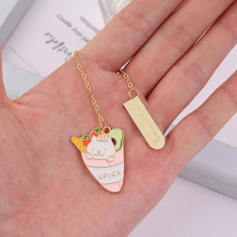 Jane Lime metal bookmark with cartoon cat pendant in four designs measuring 3.8x18.3cm