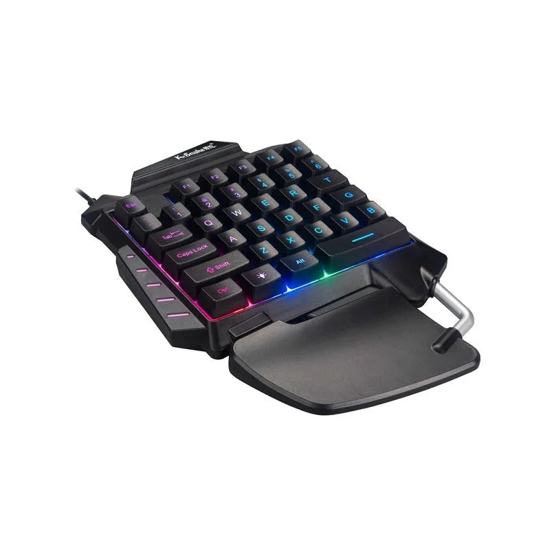 Black left-handed gaming keyboard with detachable palm rest and shortcut keys for desktop gaming