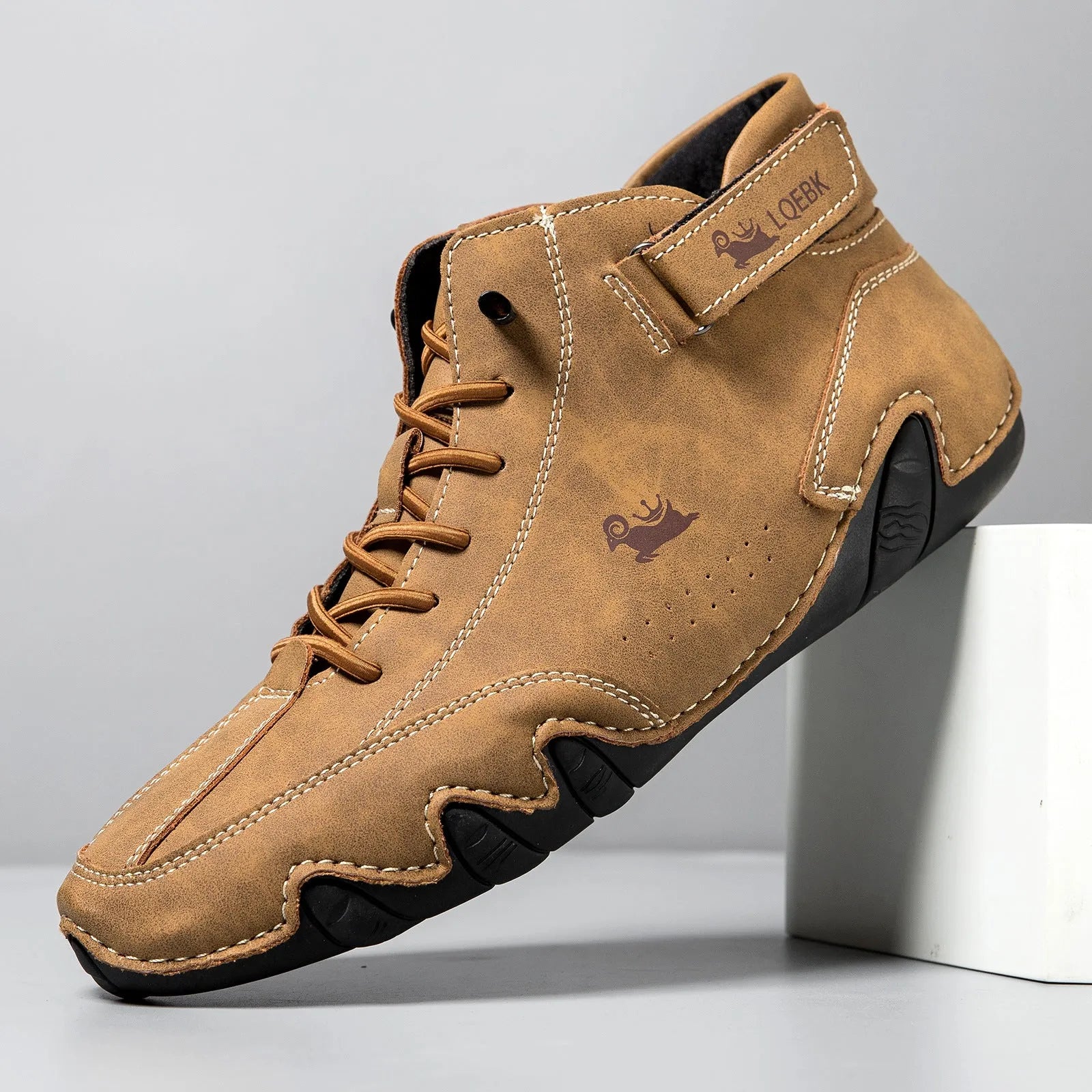 Men's brown high-top octopus Martin boots with a round toe and visible stitching on a flat rubber sole.
