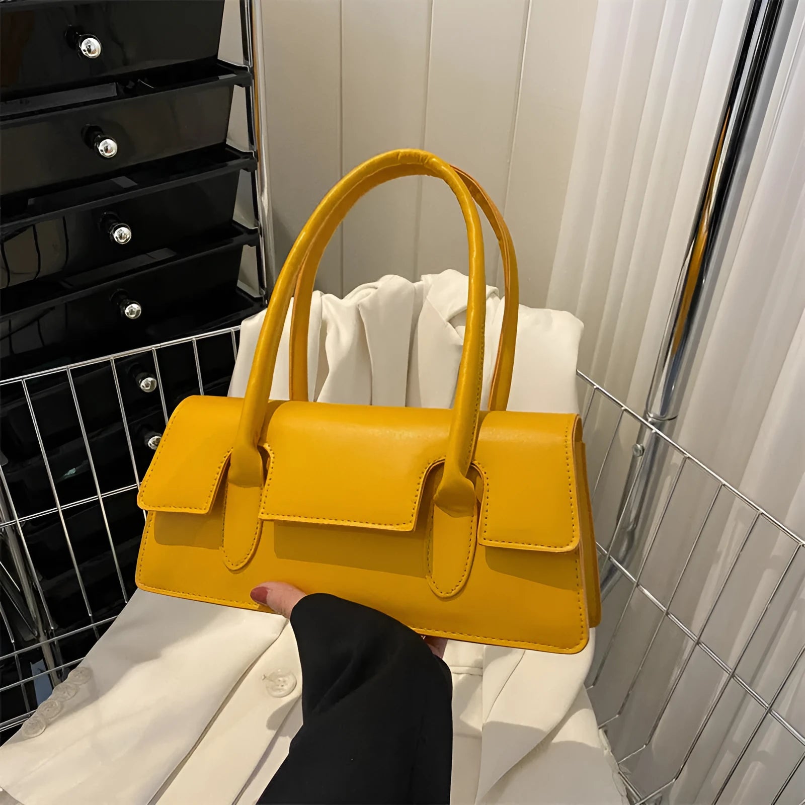 Women's small square shoulder bag in PU leather with horizontal rectangle shape and stitching detail