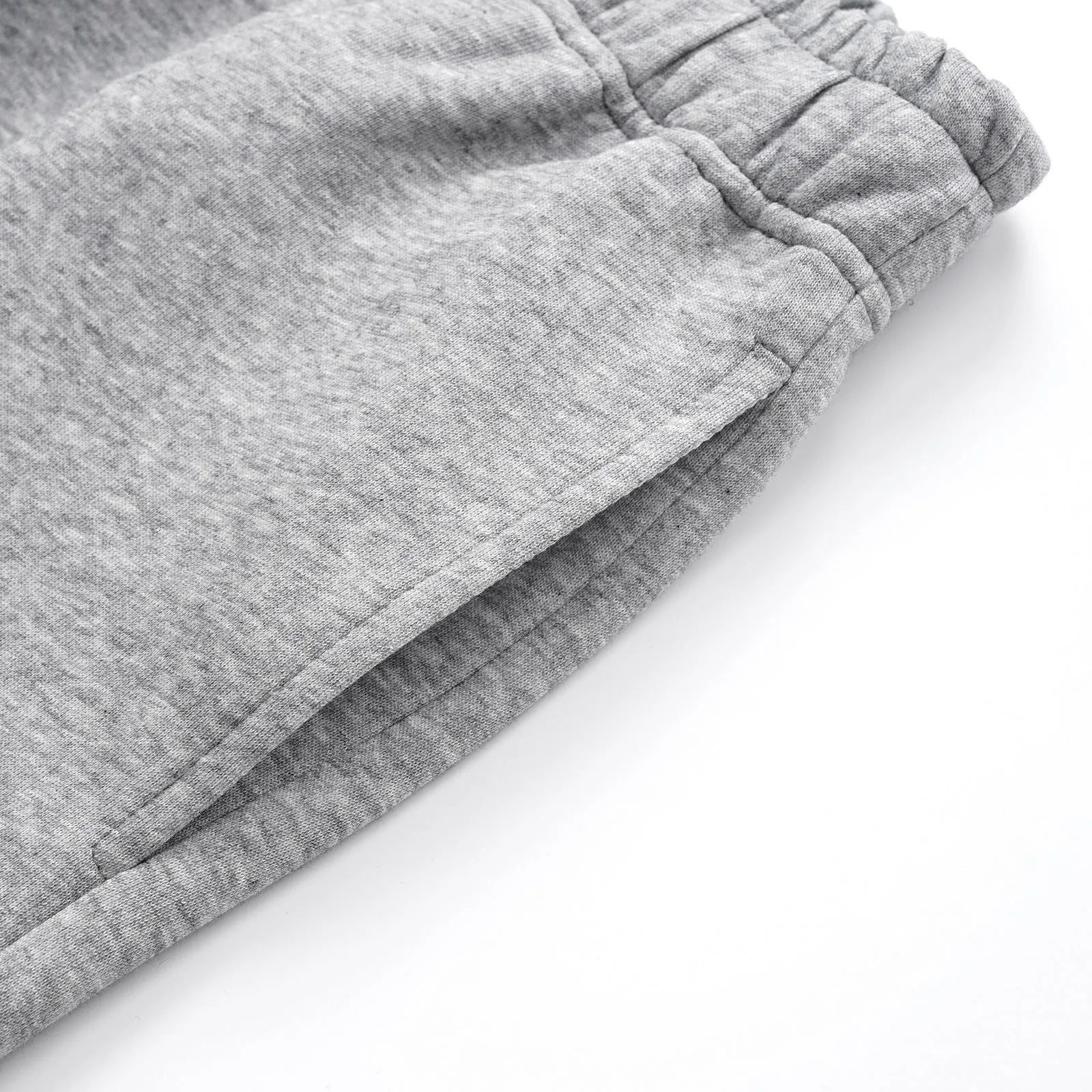 Men's grey straight-leg casual trousers showing wide-leg loose fit and mid waist design