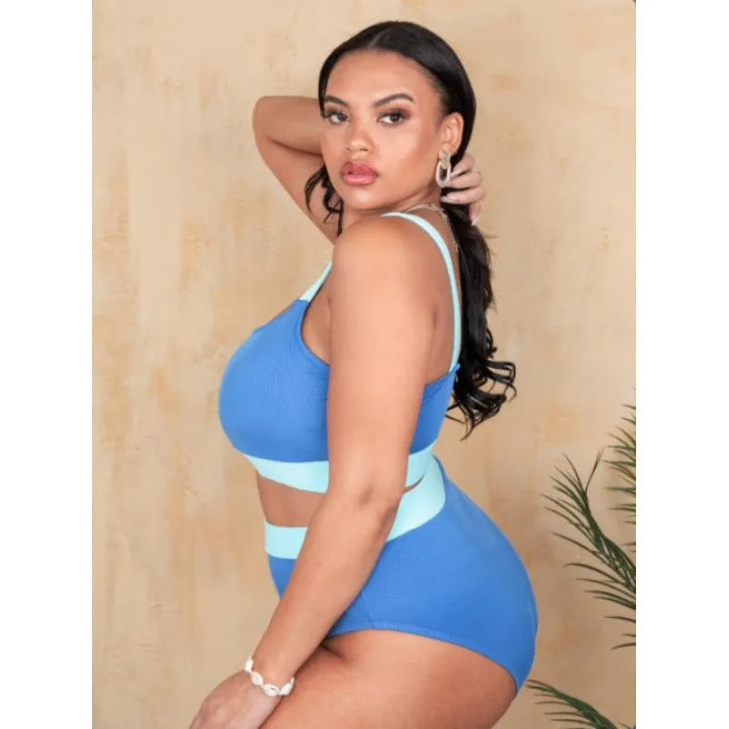 Women's high waist bikini swimsuit with split sides and stitching detail in a solid colour.