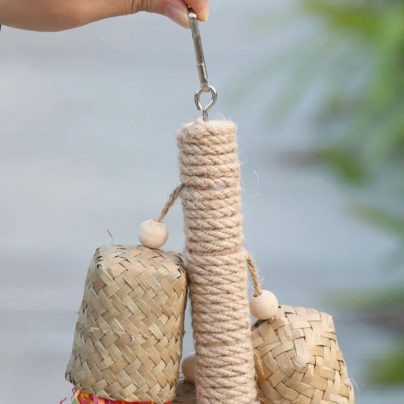 Wood and sisal parrot toy with colourful shredded paper filling, size 15 by 35 centimetres