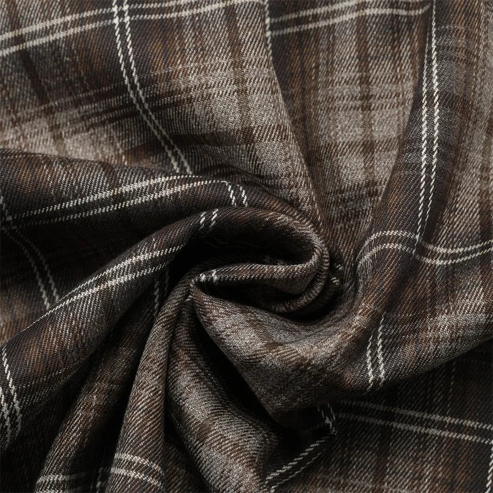 Men's black and brown plaid short sleeve shirt with embroidered letter detailing on the front