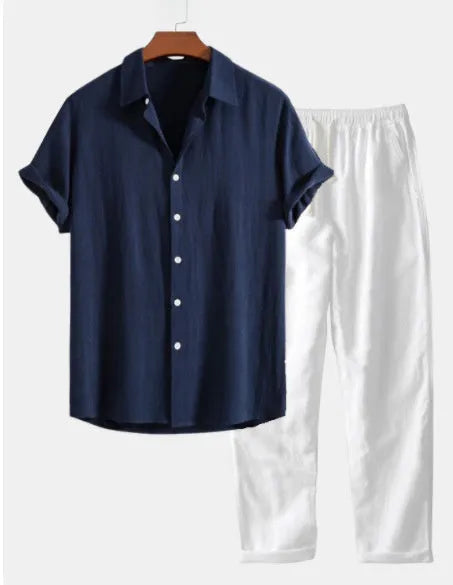 Navy blue casual short sleeve beachwear suit with trousers on a hanger.