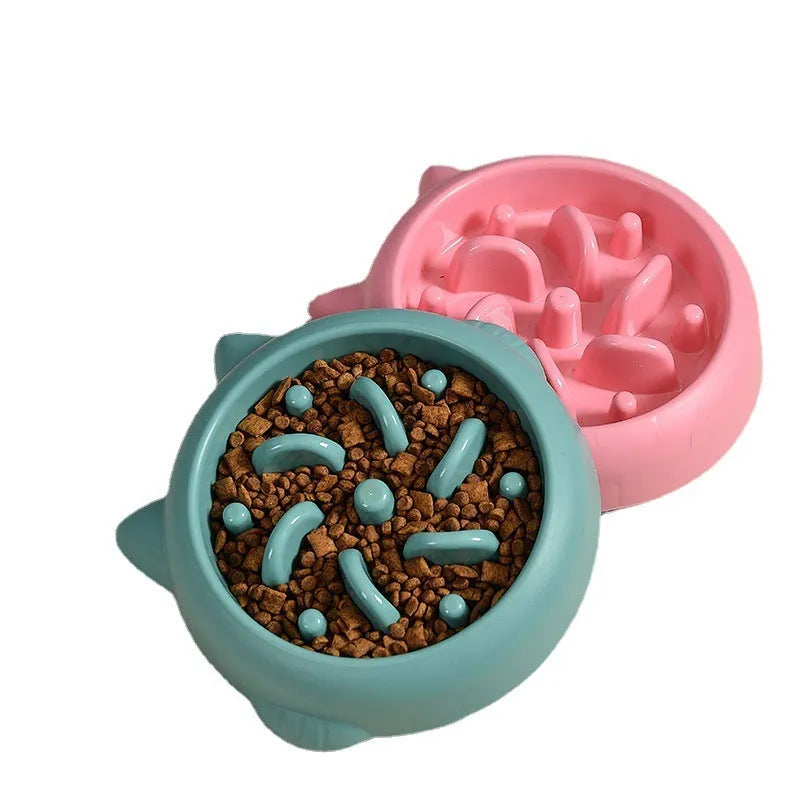 Green pet slow feeder bowl with raised internal maze design for dogs and cats