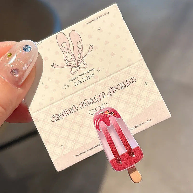Resin hair barrette featuring a cartoon ice cream design in pink, red, coffee, purple, and beige colour options.