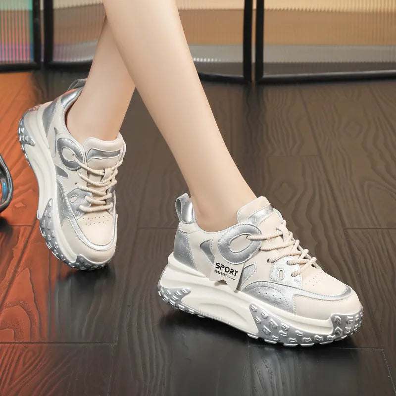 Women's thick-soled leather sports casual shoes in silver colour with round toe and lace-up front.