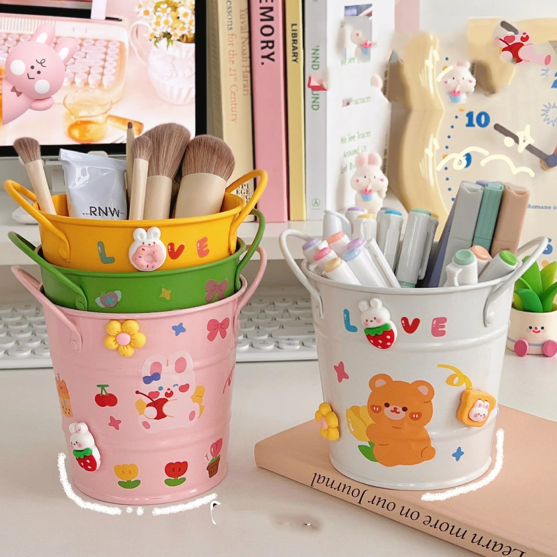 Round metal desktop pen holder in a choice of colours, some with decorative sticker patches.