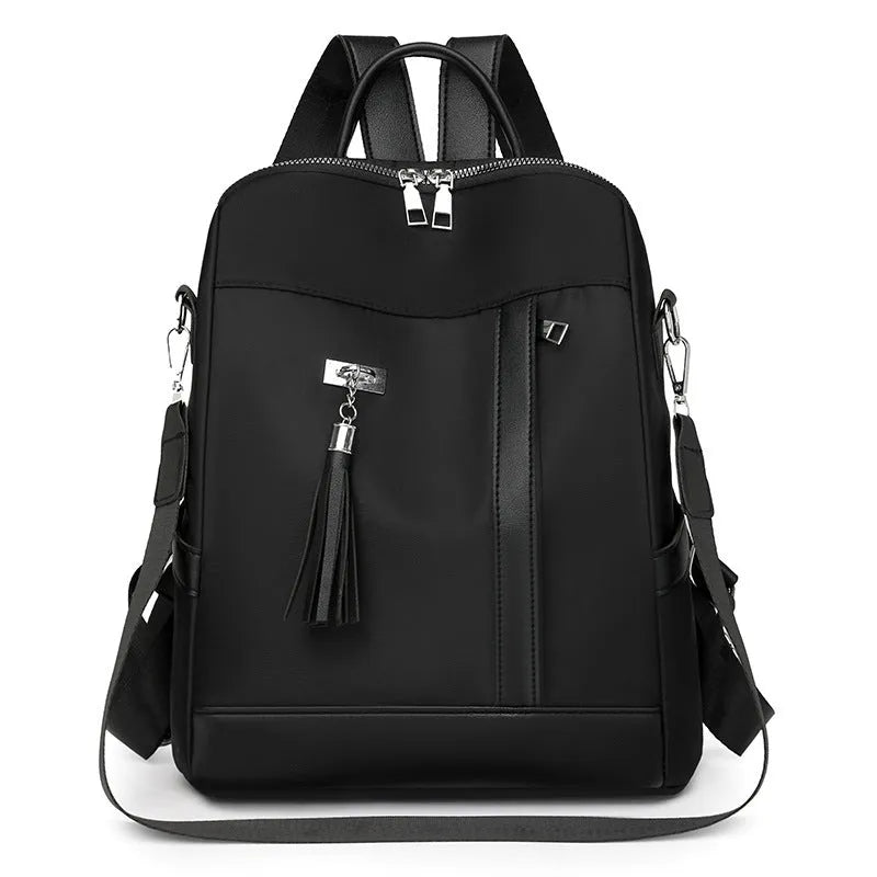 Large soft PU backpack in black with multiple pockets and internal mobile phone storage