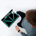 Black rectangular 60x90cm football training mat with a non-slip rubber base.
