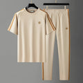 Men's ice silk style tracksuit set with short sleeve top and trousers in blue colour