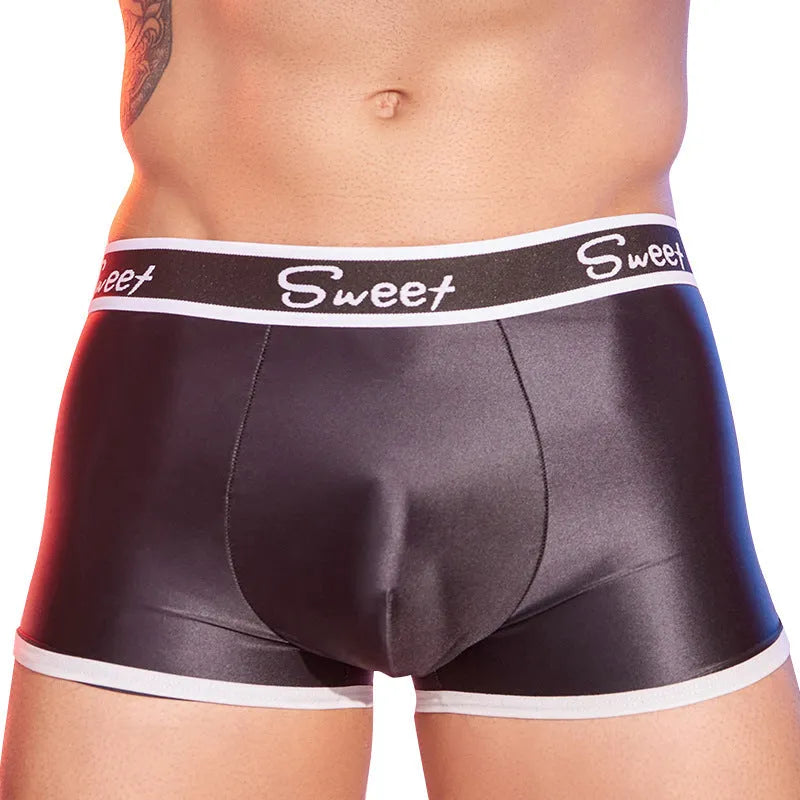 Men's shiny silky nylon boxer shorts in free size available in black, white and sapphire blue colours